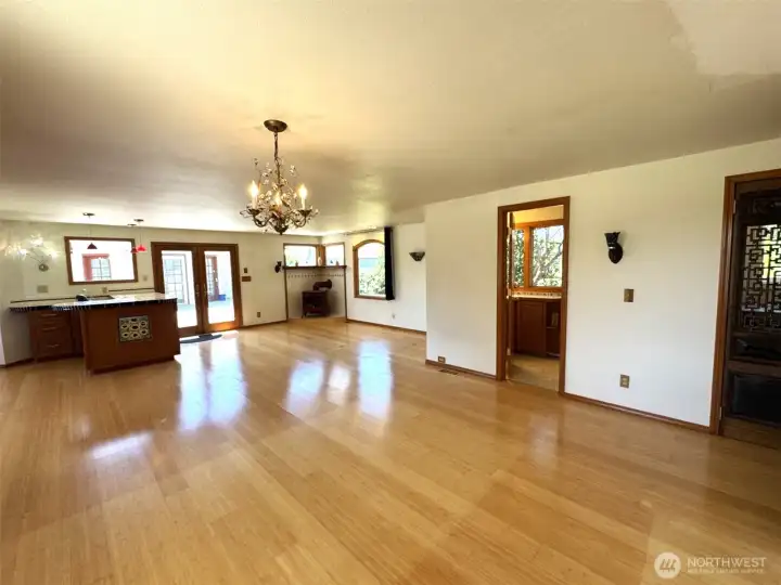 Rec room, looking toward the 3/4 bath, wet bar, gas stove, and deck to the pool/spa room.