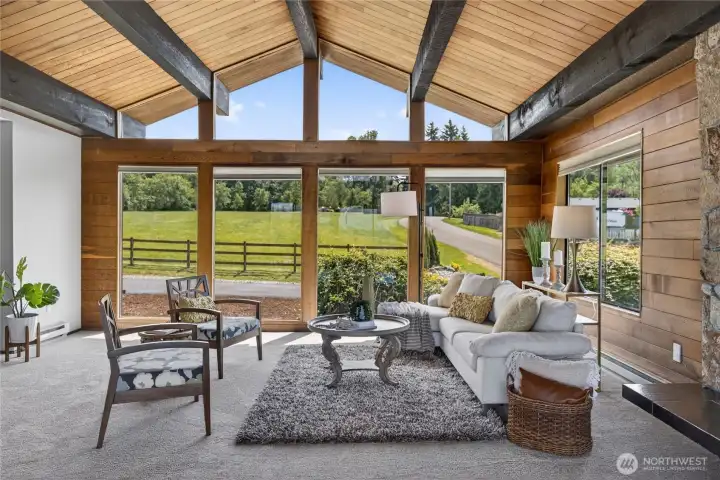 Rich exposed beams and a wood burning fireplace make this the perfect spot to gather. Rich exposed beams and a wood burning fireplace make this the perfect spot to gather.