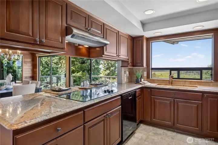 Plenty of storage and the VIEWS from the kitchen sink window —-WOW! Plenty of storage and the VIEWS from the kitchen sink window —-WOW!