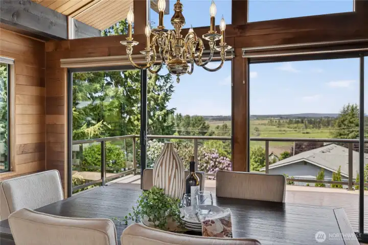 Dining room effortlessly flows into the living room and kitchen. Dining room effortlessly flows into the living room and kitchen.