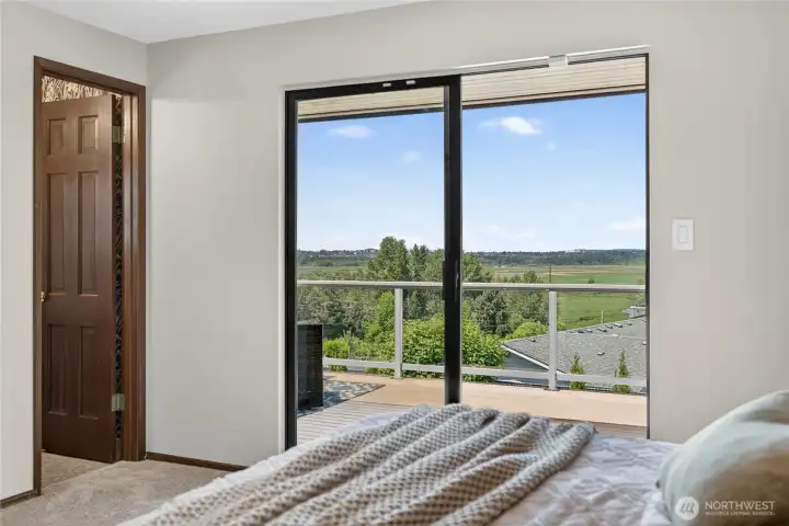 VIEWS and deck access from the primary suite. VIEWS and deck access from the primary suite.
