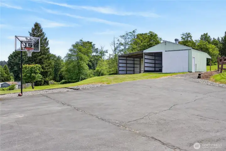 A sports court with a NEW basketball hoop! A sports court with a NEW basketball hoop!