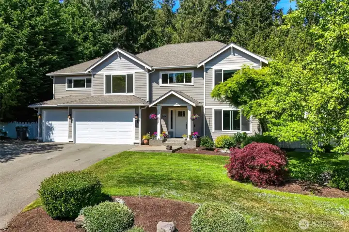 Beautiful, mature landscaping and lush 25' greenbelt buffer.