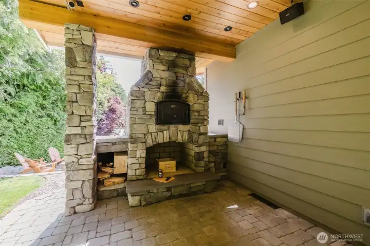 Constructed of Stone, Wood burning fireplace and Wood-Fired Pizza Oven.