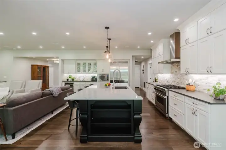 Viking appliances: 36” range, gas stove, electric oven; side by side fridge,   microwave, dishwasher.