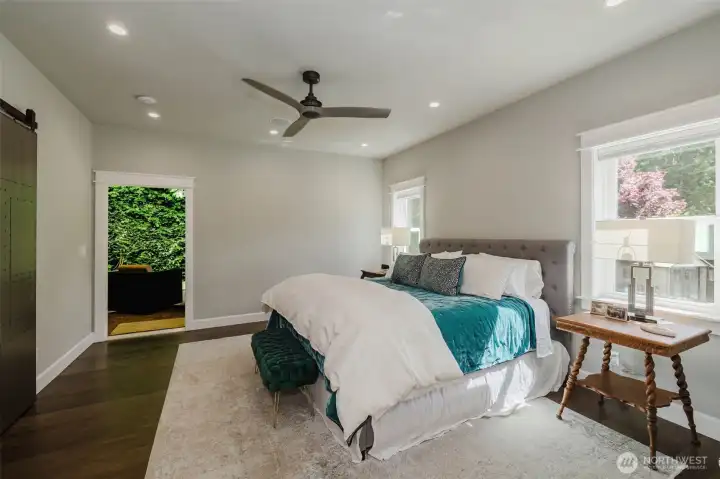 Primary suite with access to the back patio, as well.