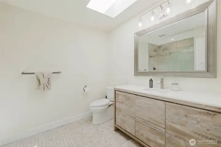 Bedroom #3 vanity with quartzite vanity top.
