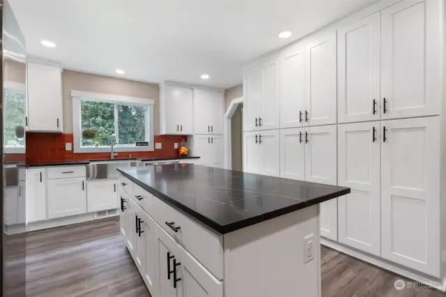 Indulge in culinary excellence in this immaculate recently renovated kitchen, a cook’s delight!