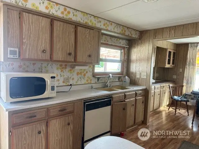 Kitchen with microwave oven