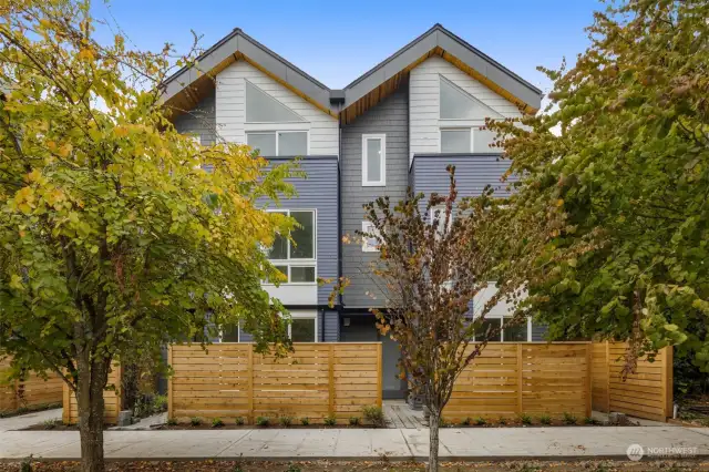 Welcome to Lotus II in Whittier Heights, where modern design meets the charm of a tree-lined avenue. This striking exterior previews the style and elegance that awaits within.