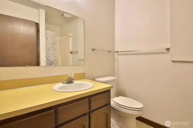 3/4 bath with utility room on lower level.