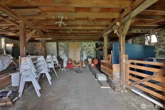 Storage galore on the lower level of the barn...Livestock? Dance Hall? Artist studio ?