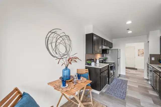 The cozy breakfast nook overlooks the Narrows, with direct access to a private deck—the perfect spot to enjoy your morning coffee while taking in the views of passing boats and marine life.
