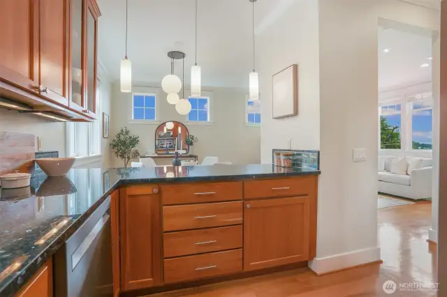 Chef's kitchen looking to dining & living room spaces.