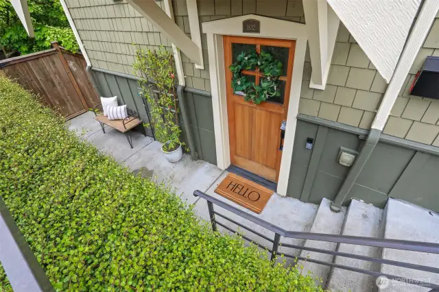 Inviting entry just steps away from private reserved parking.