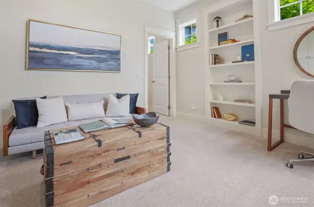 Sunny family room space with access to bedroom with it's own bath.