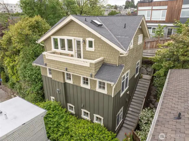 This home faces West and is perched high on the hill to take advantage of mountain, city, & territorial views.