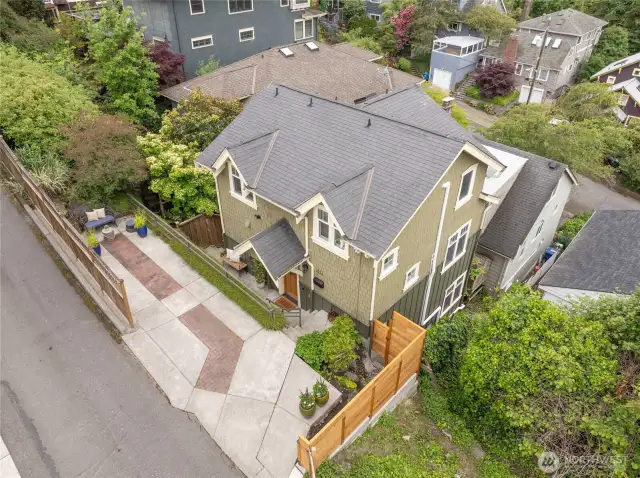 Arial view of home and property. Easy private drive parking off the alley.
