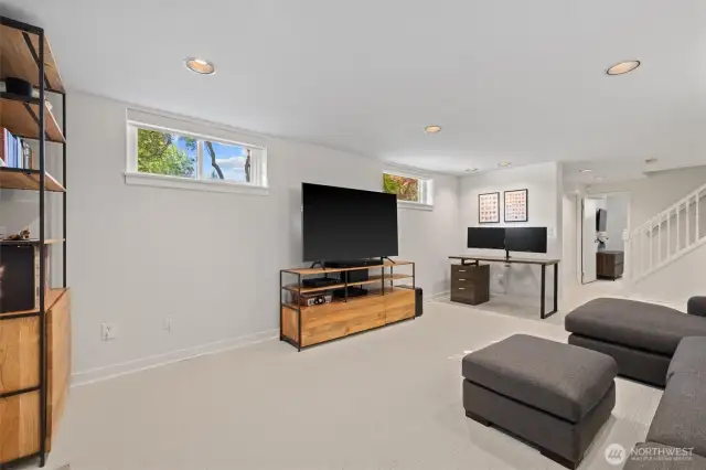 Large enough to watch movies, sports and have a computer desk.