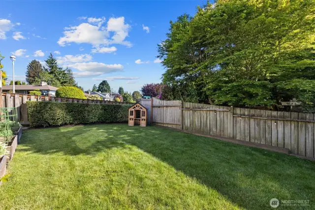 The grassy space offers a lot of privacy as no home is directly behind you since there's a street and an alley.