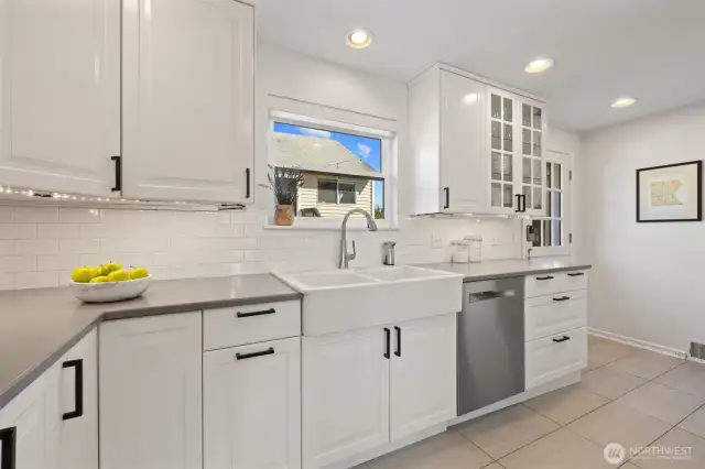 Updated kitchen has farm sink.