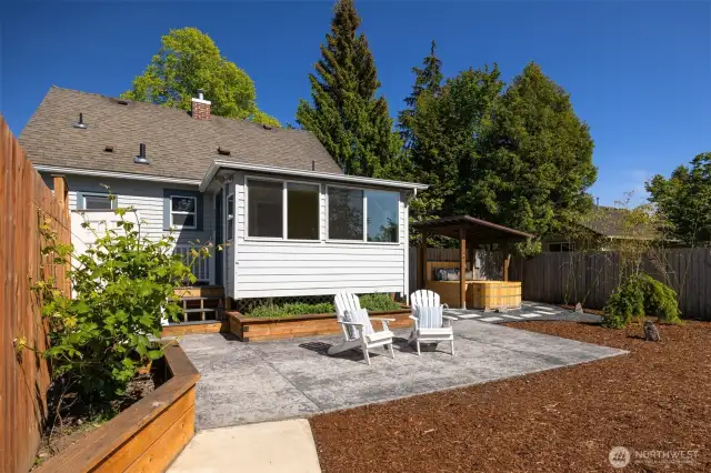 The stamped concrete patio is the perfect perch to soak in vibrant western sunsets.