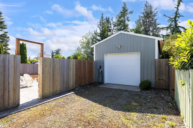 The long driveway leads to the 14x 40 drive through shop with an attached green house.