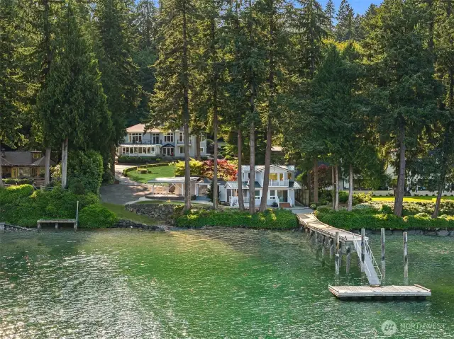 An incredibly rare waterfront compound with 2 houses! The 4300 sq ft estate quality main house and a 1300 sq ft beach house.