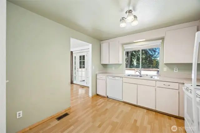 Room on the back side of the kitchen for a coffee bar or baker's rack.