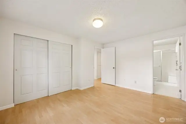 Closet space and primary bath shown here.