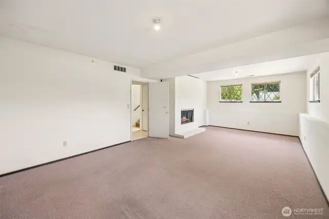 Downstairs you will find an extra large family room with a fireplace.