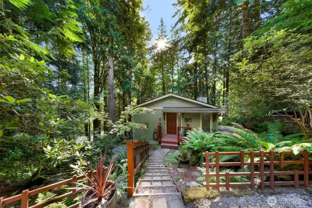 From the main parking area walk down the stairs to a whimsical treat, there is so much to see on this property!