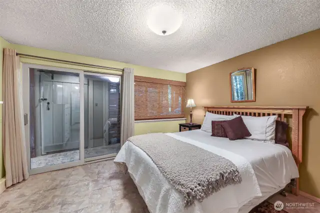 Bedroom 3 - lower level with sliding doors to covered patio