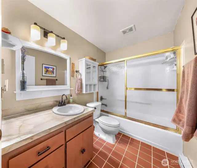 Full bath - downstairs situated between all 3 bedrooms for ease of access
