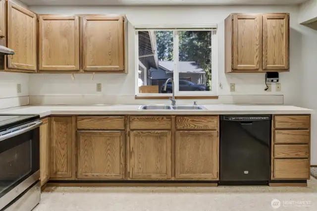 Plenty of counter space and cabinetry.