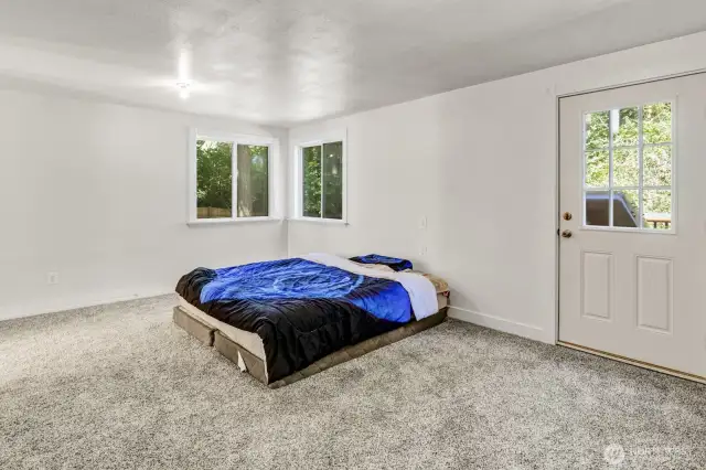 Attached garage has been converted into additional living space: bedroom with walk-in closet and roughed-in bathroom.