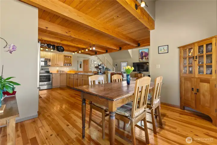 Easy flow into the dining area, exposing the refinished hardwood floors.  Classy and timeless!
