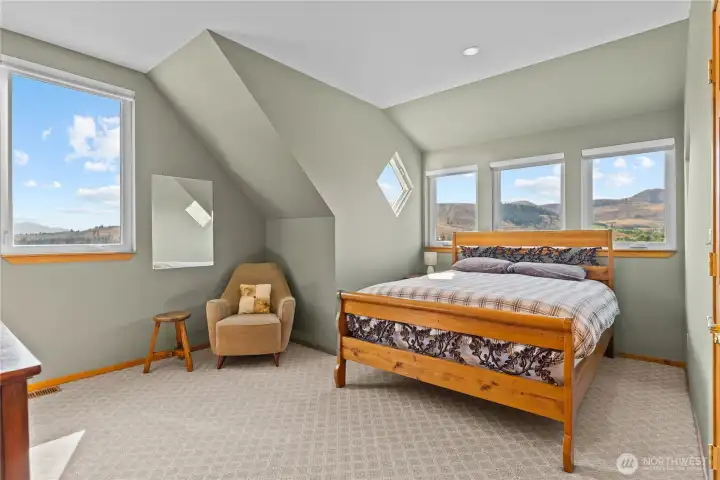 Upstairs bedroom #2- warm, welcoming and comfortable.