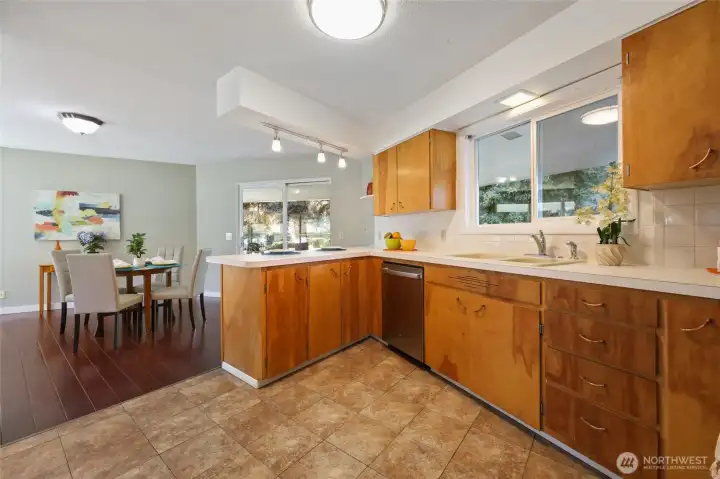 Fabulous wood cabinets. Dishwasher and range included. Large window to backyard.