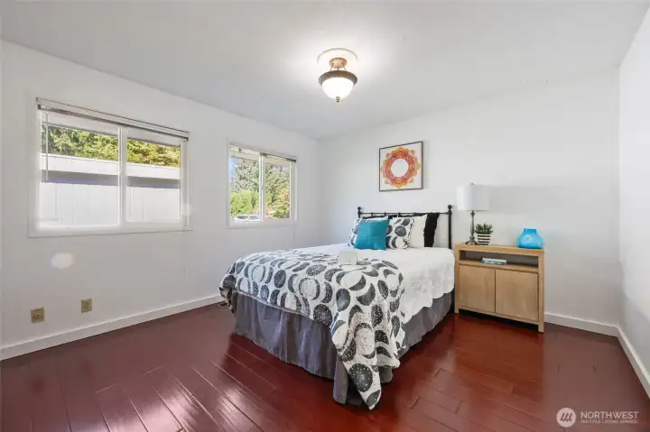 Primary bedroom at end of hallway.