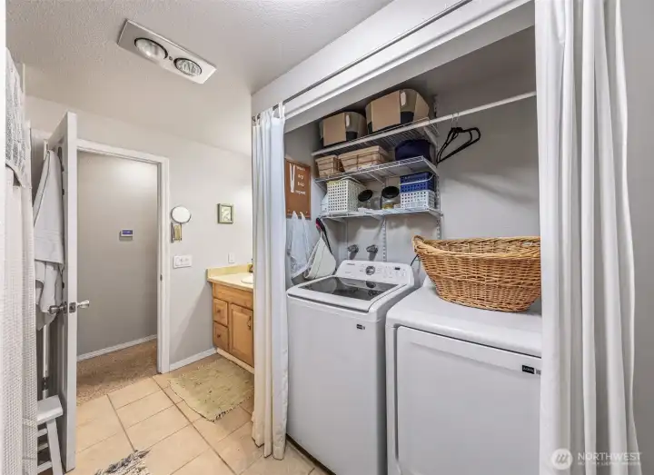 Full bathroom with tub/shower combo and utility area. New washer/dryer coming soon.