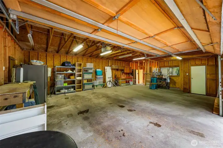 Plenty of room for your cars and your projects. Cabinets for tools.