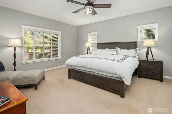 The primary suite offers a calming balance of light and space