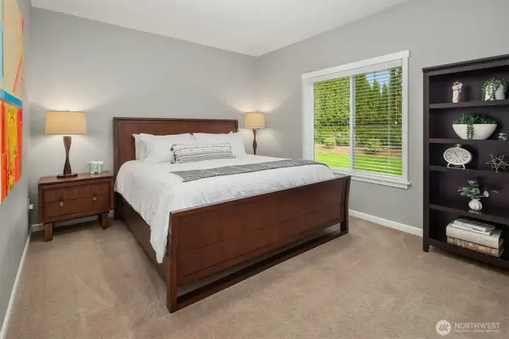 This guest room offers restful views and timeless style.