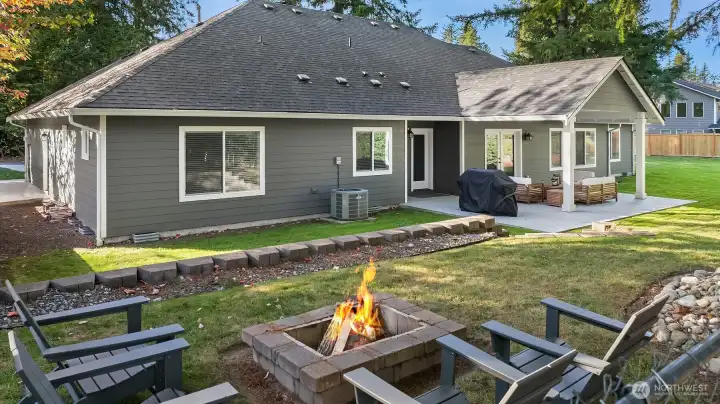 Carry your outdoor entertaining to the fire pit area.