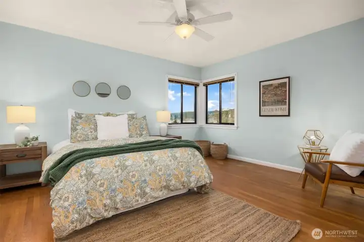 One of two upper bedrooms