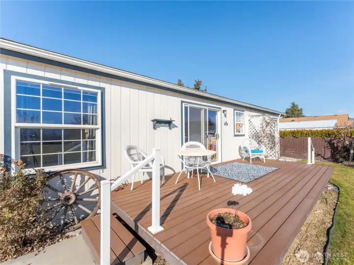 Dining room opening to outdoor living on Trex deck
