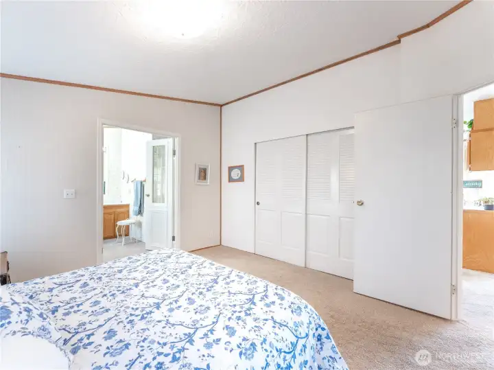 Private primary retreat featuring full five-piece bath