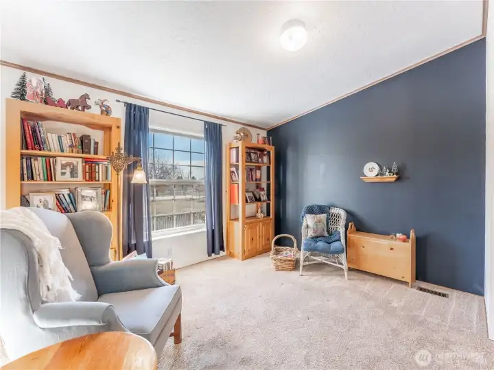 Dedicated den or office just off the main living area