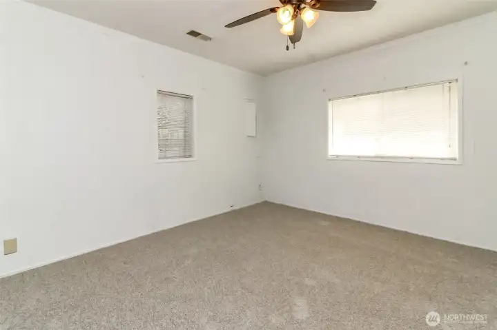 The first bedroom offers a comfortable and versatile space.